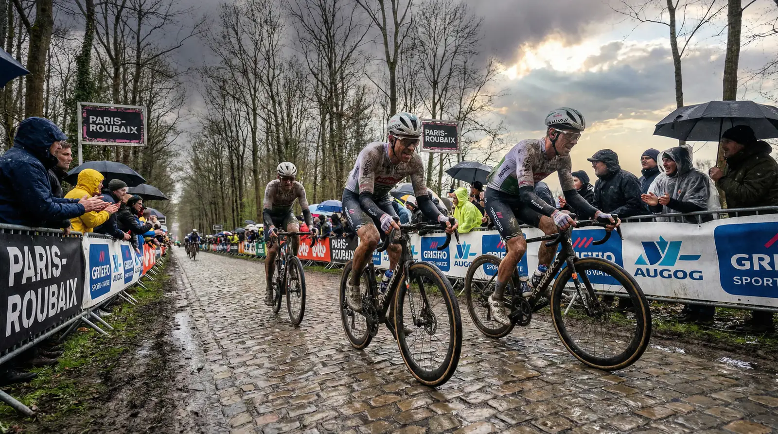 Ciclistas rodando sobre los adoquines mojados del sector Arenberg en la París-Roubaix